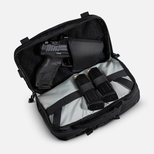 TRGR Logan CCW Waist Pack With Loop, Stealth Black, view of rear compartment with pistol and magazines