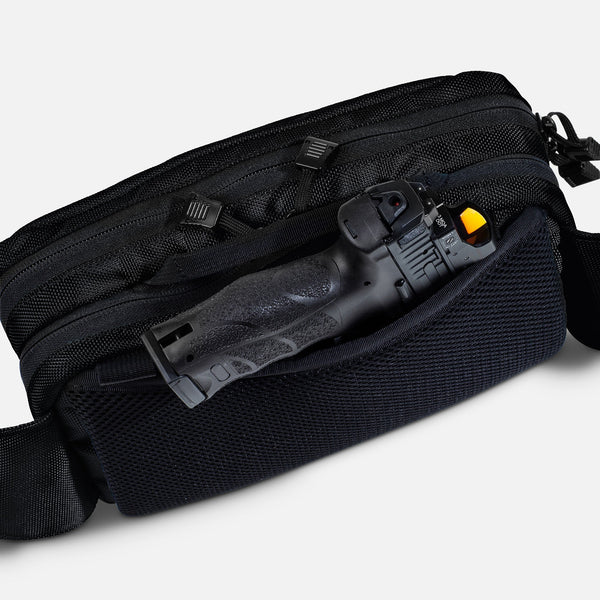 TRGR Logan CCW Waist Pack, Stealth Black, view of pistol protruding from hidden pocket